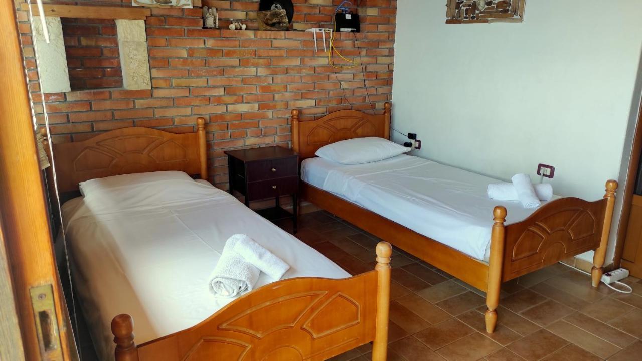 Q Bay Apartments Кєпаро Екстер'єр фото